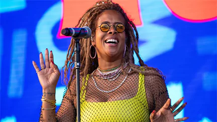 Woman talking into the microphone